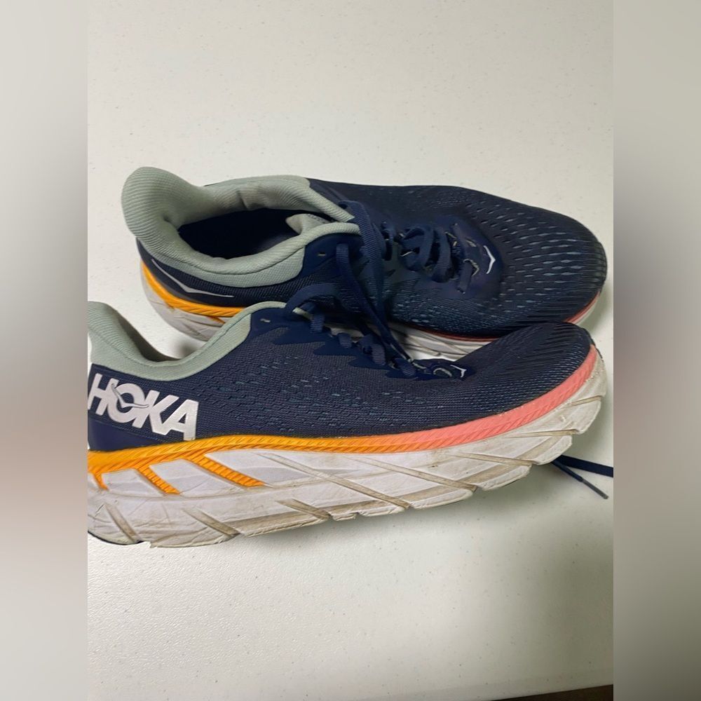 Hoka One Clifton 7 running shoe blue colorway orange used condition womans 8.5